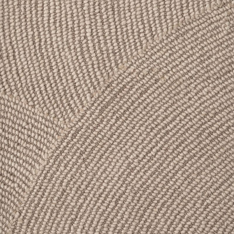 Close-up of beige fabric texture with a subtle pattern