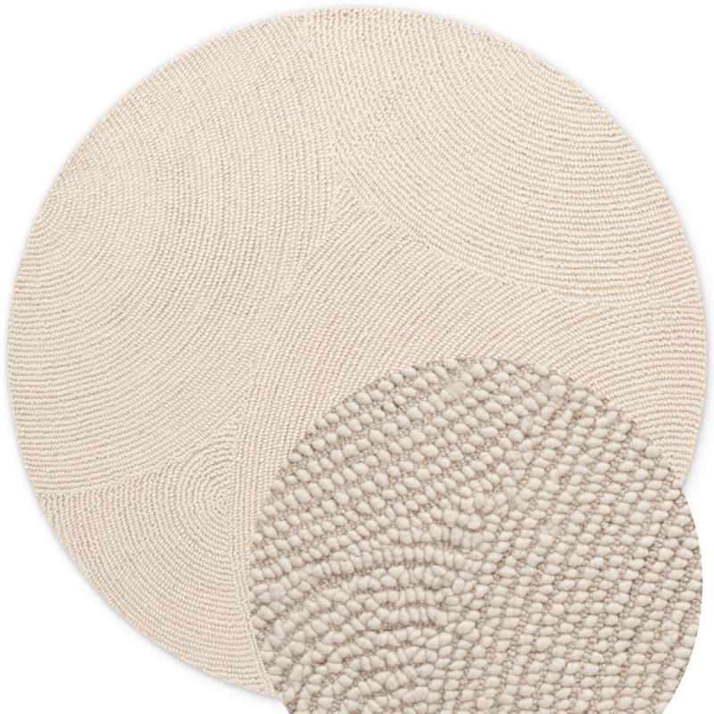 Round beige rug with textured pattern on a white background
