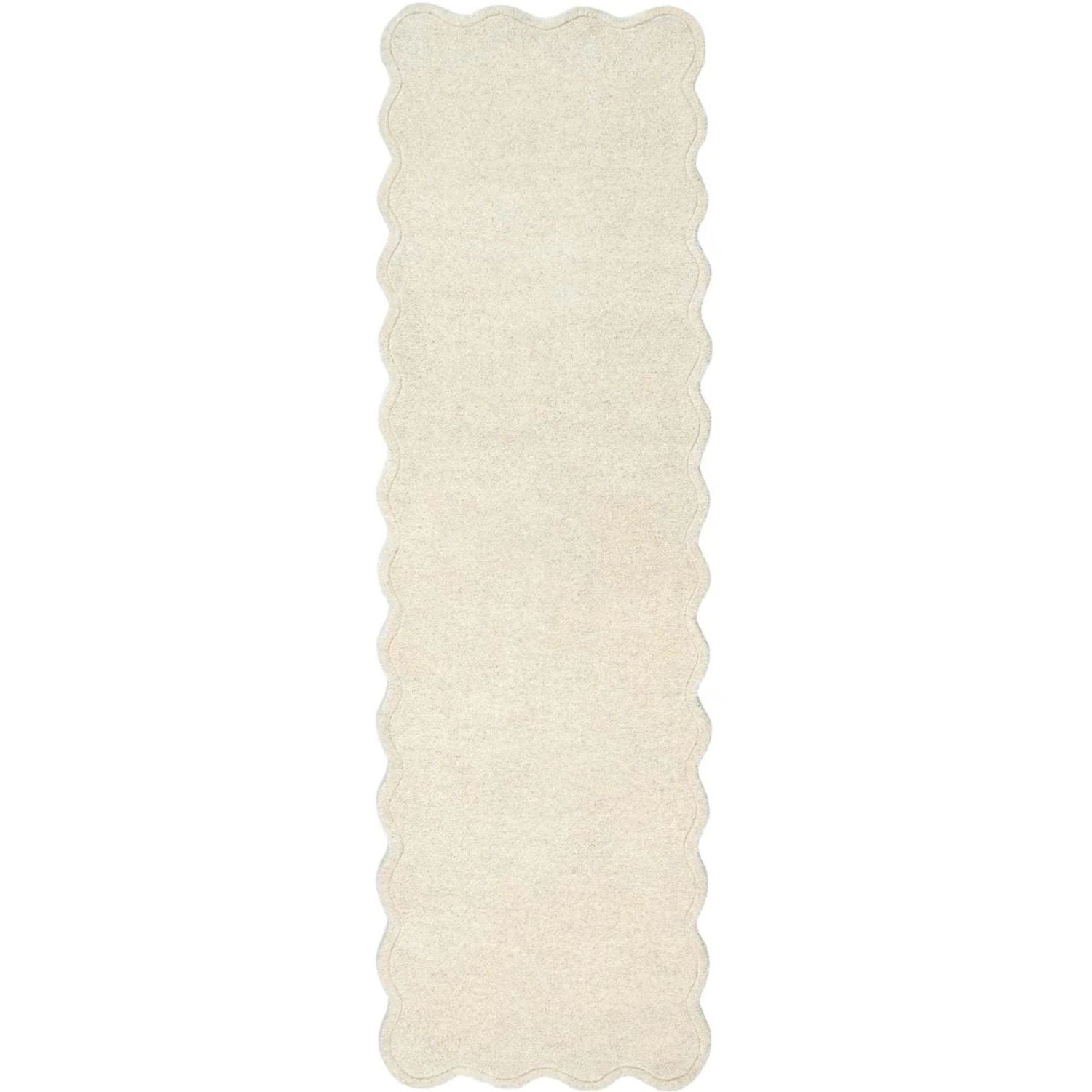 Rectangular white rug with scalloped edge on a white background