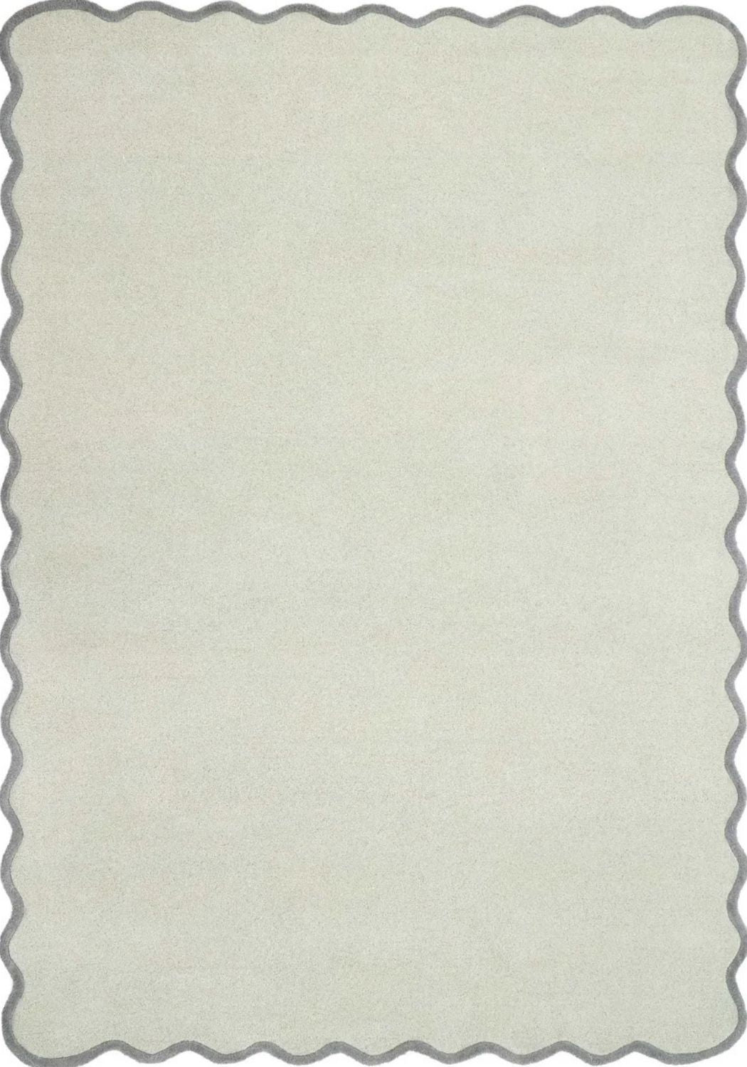 Rectangular area rug with scalloped edge in a light gray color on a white background