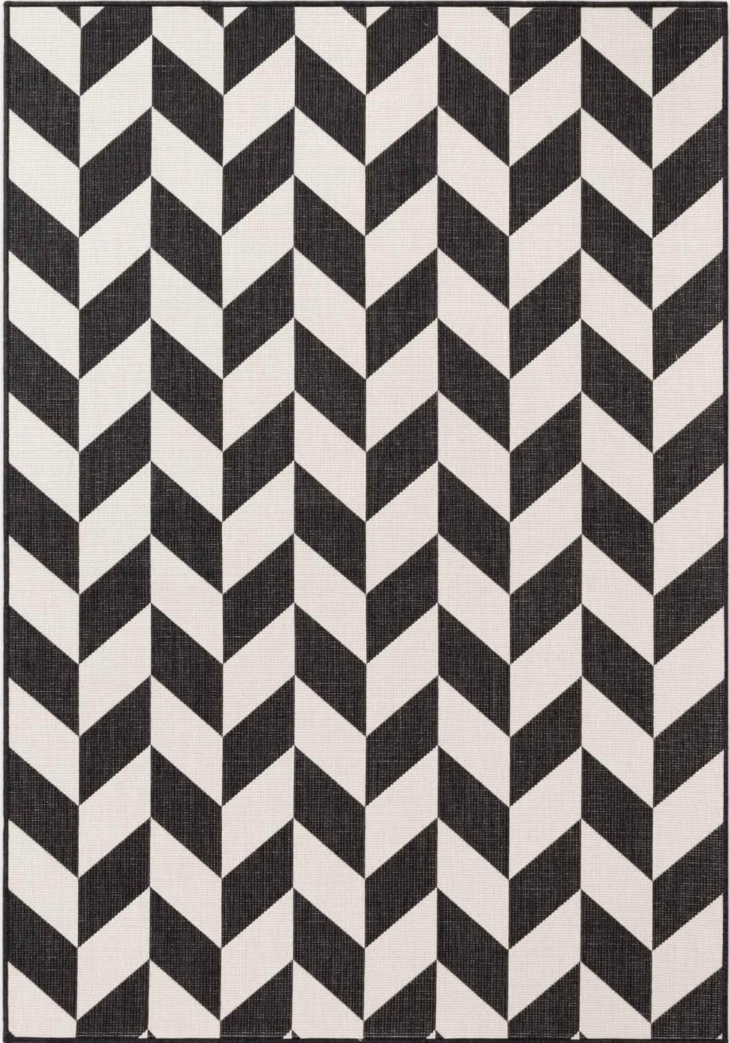 Black and white geometric patterned rug