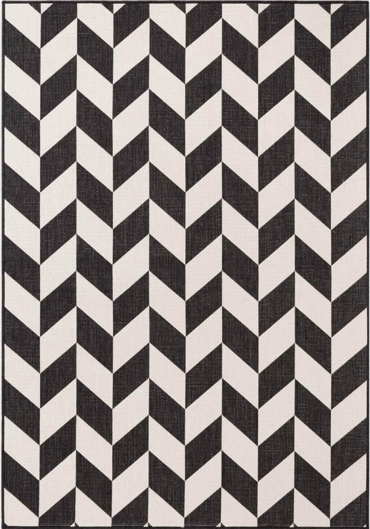 Black and white geometric patterned rug