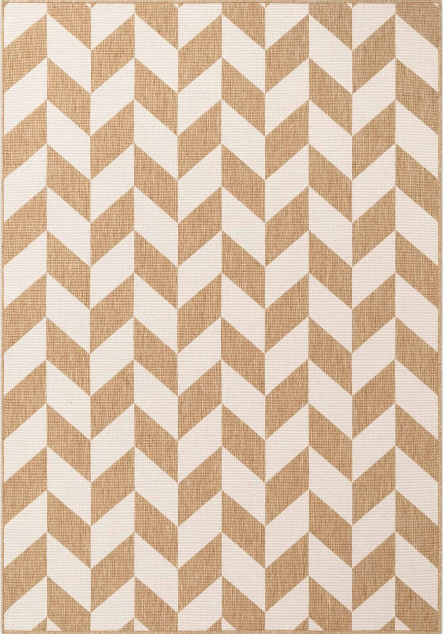 Rug with a beige and white chevron pattern