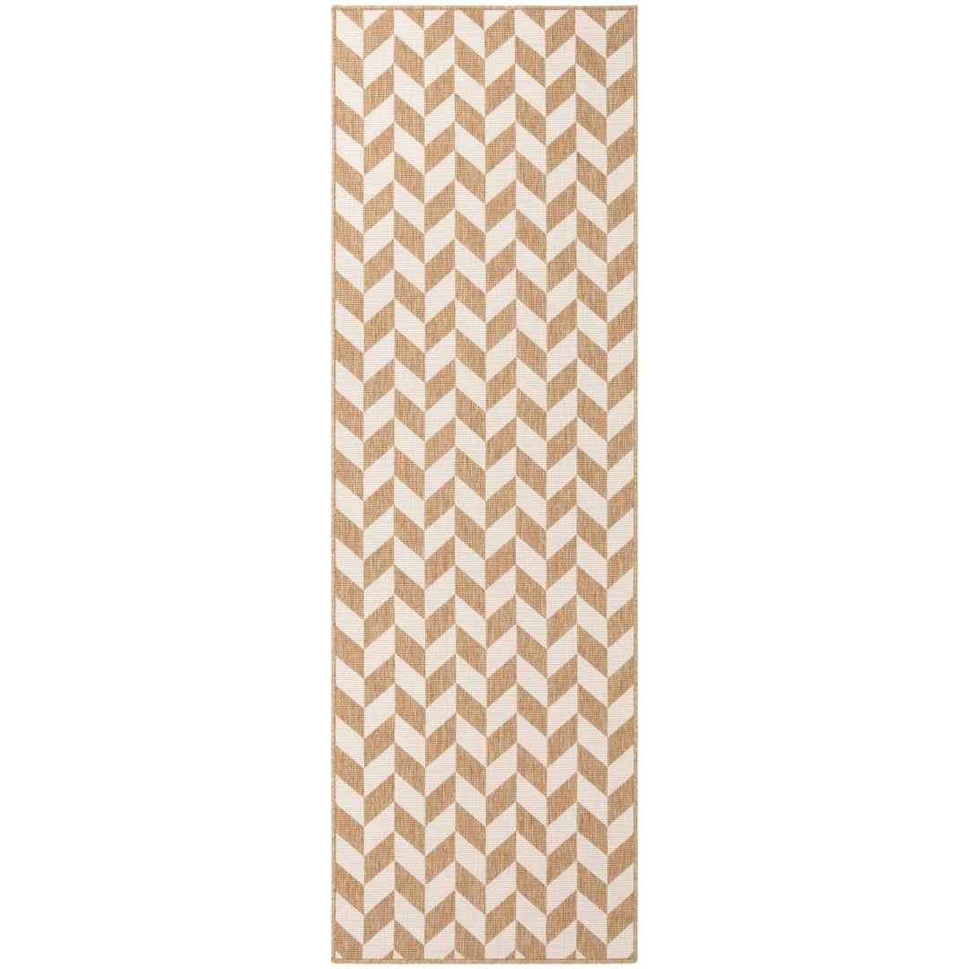 Beige and white chevron patterned rug on a white background