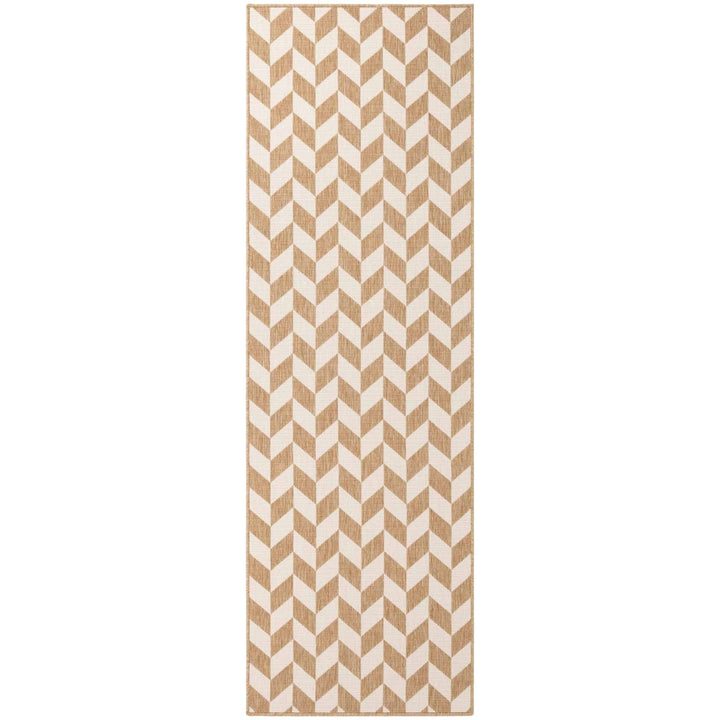 Beige and white chevron patterned rug on a white background