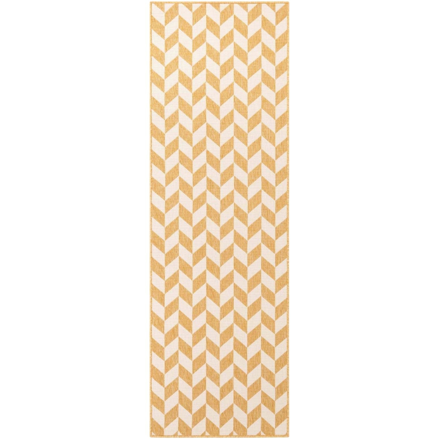 Beige and white chevron patterned towel on a white background