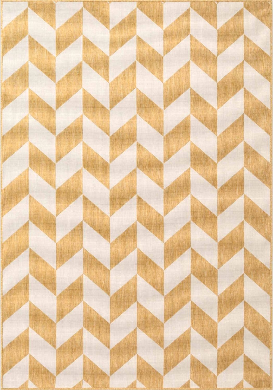 Patterned fabric with alternating yellow and white stripes on a textured background