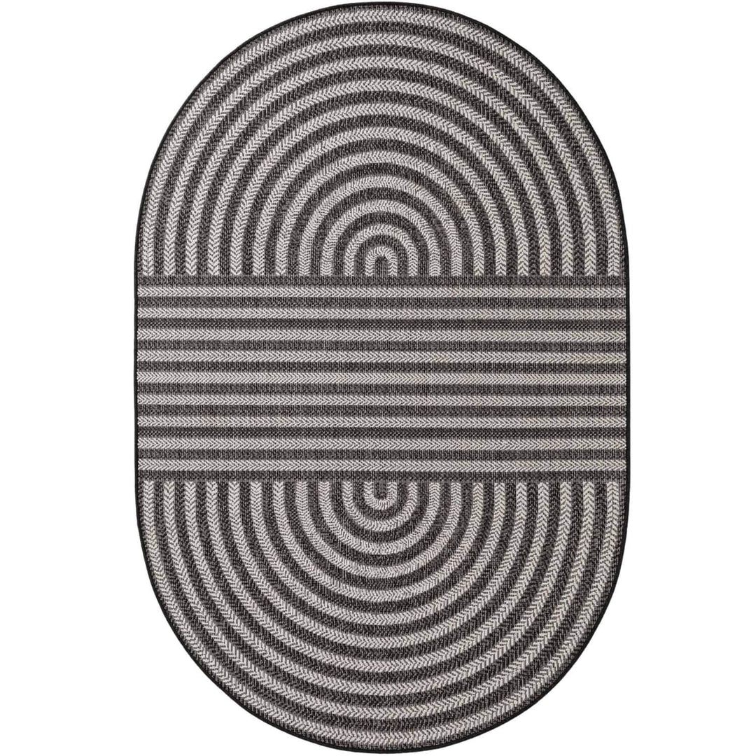 Oval-shaped rug with concentric circle pattern on a white background