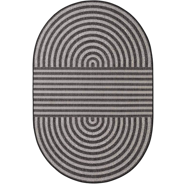 Oval-shaped rug with concentric circle pattern on a white background