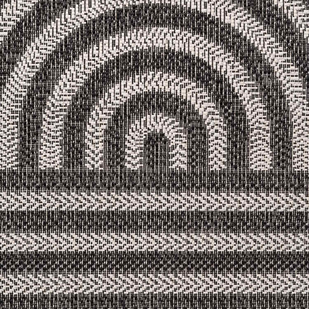 Black and white geometric patterned fabric texture