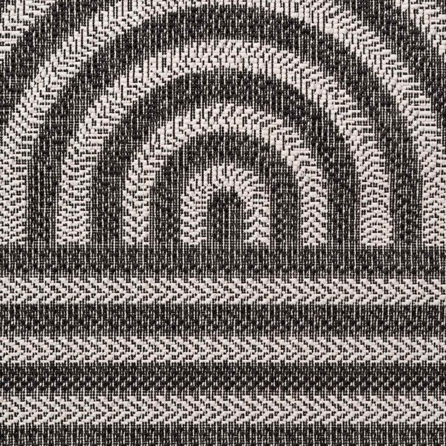 Black and white geometric patterned fabric texture
