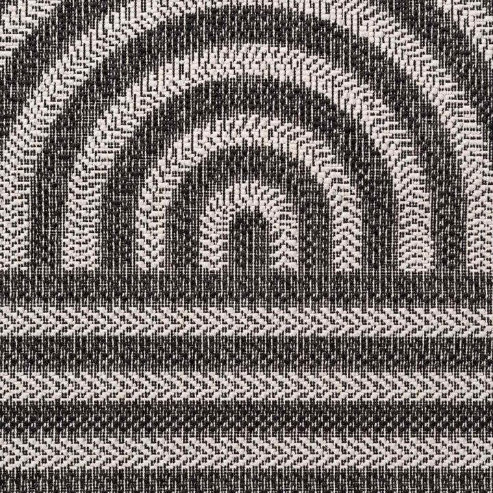 Black and white geometric patterned fabric texture