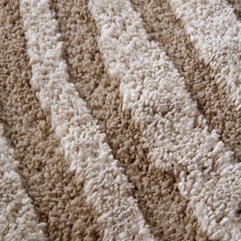 Close-up of textured beige carpet