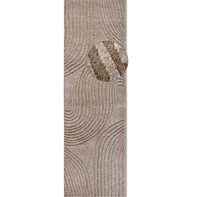 Beige textured runner rug on a white background