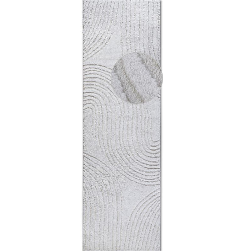 Textured gray rug with a pattern on a white background
