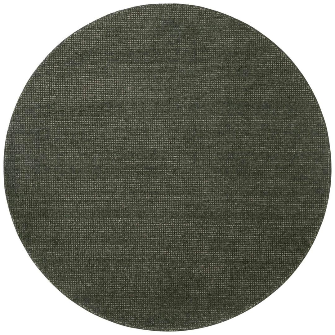 Round dark gray rug on a white background