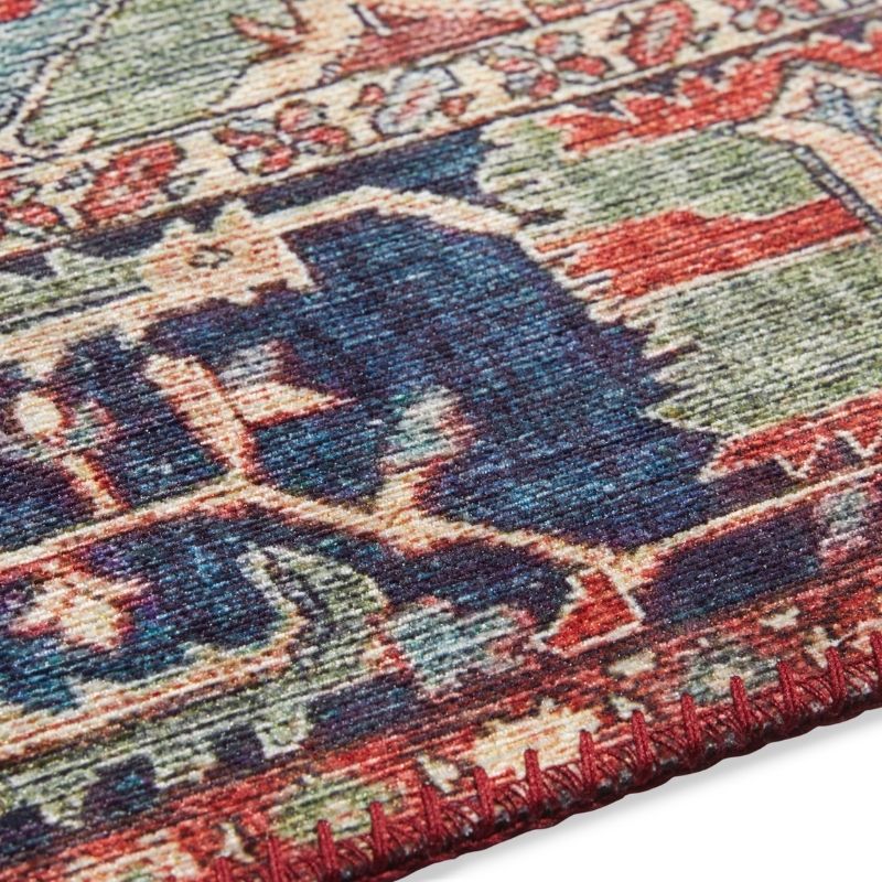 Close-up of a patterned rug with multicolor design