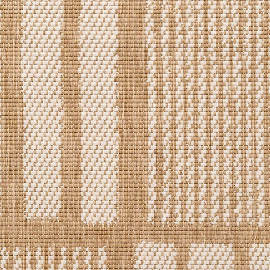 Close-up of a woven fabric with beige and white pattern