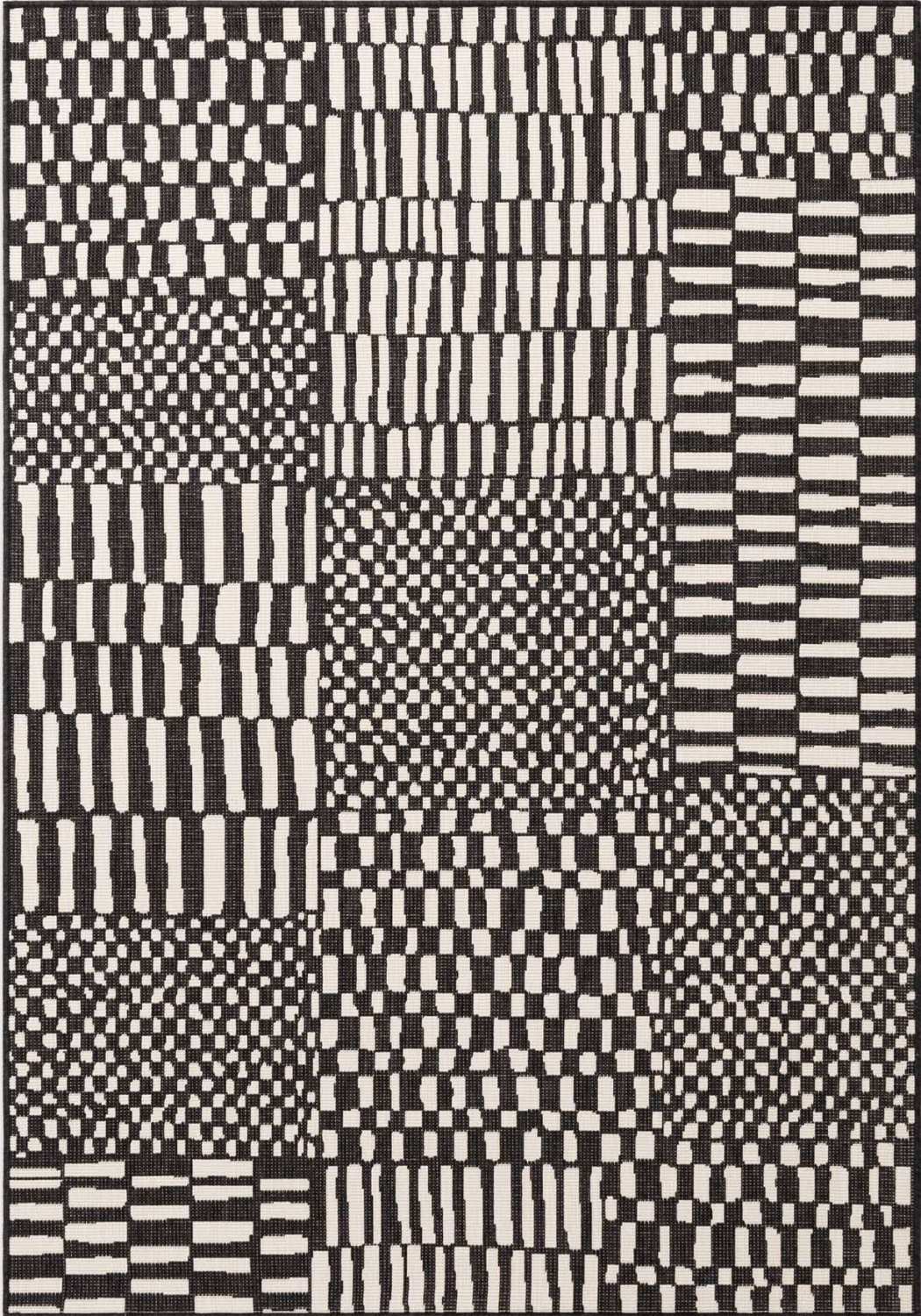 Black and white geometric patterned rug