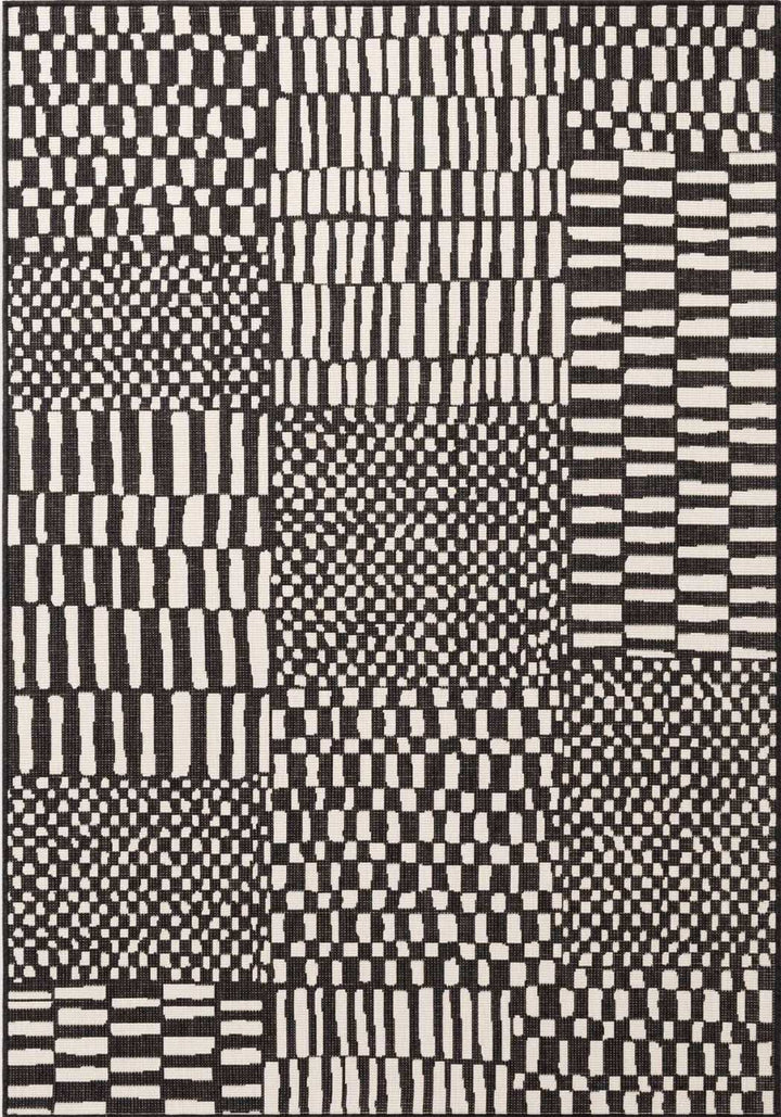 Black and white geometric patterned rug