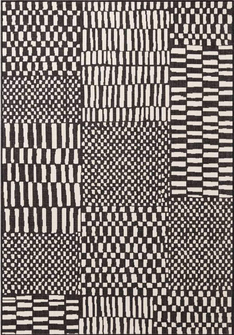Black and white geometric patterned rug