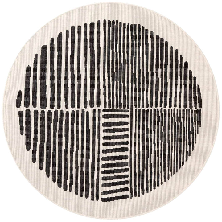 Round rug with black line pattern on a beige background