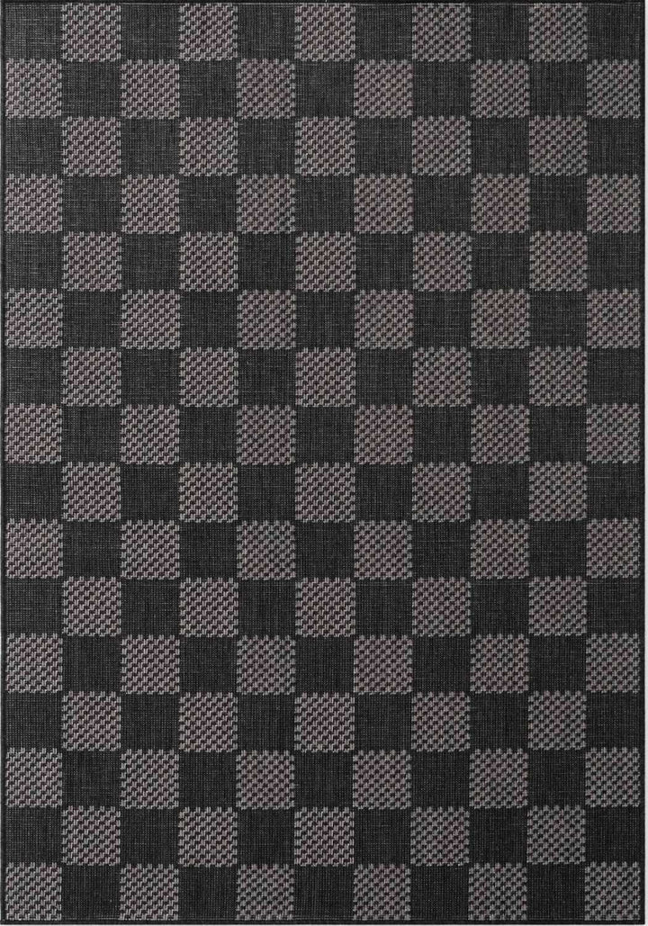 Checkered pattern rug with black and gray squares