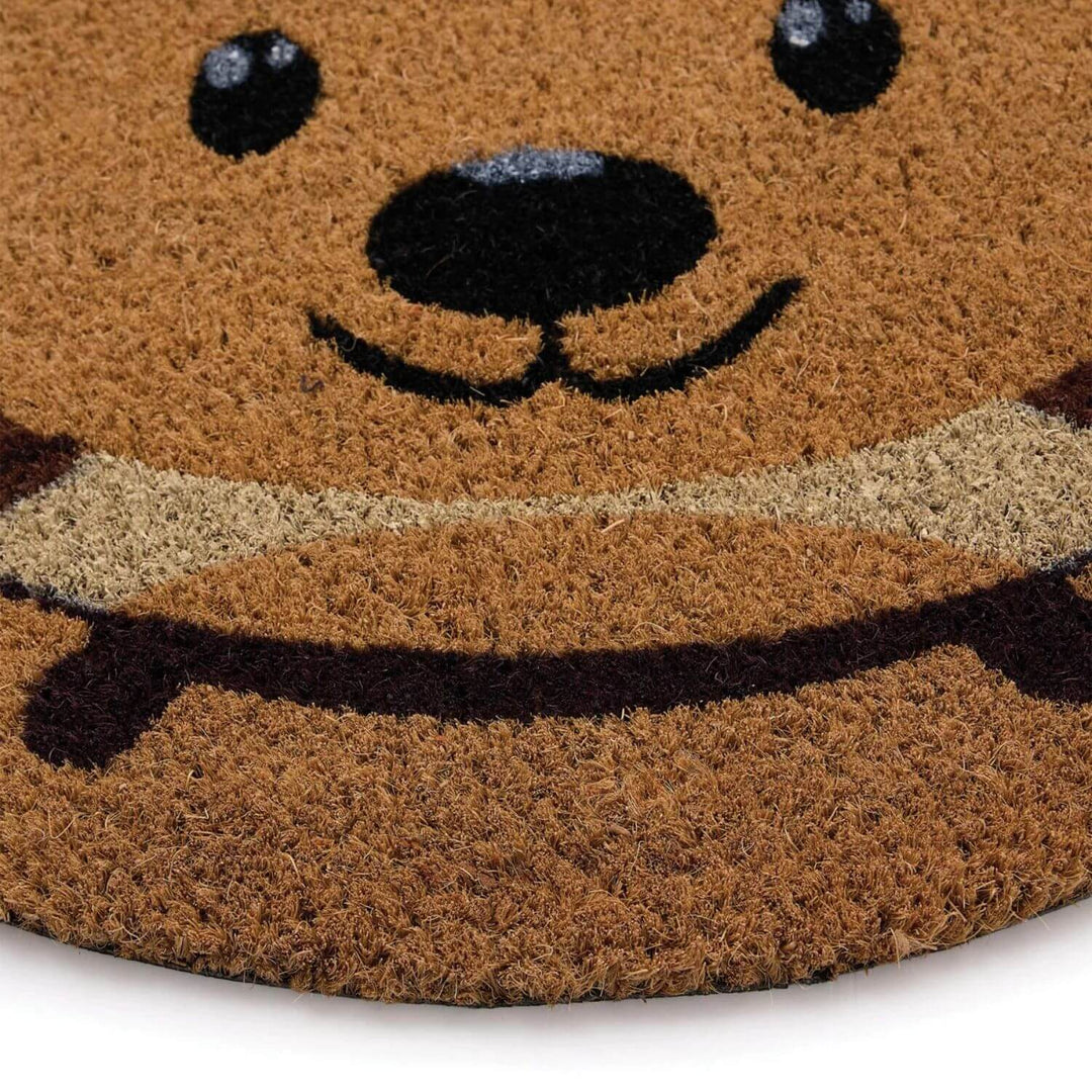 Doormat with a bear face design on a white background