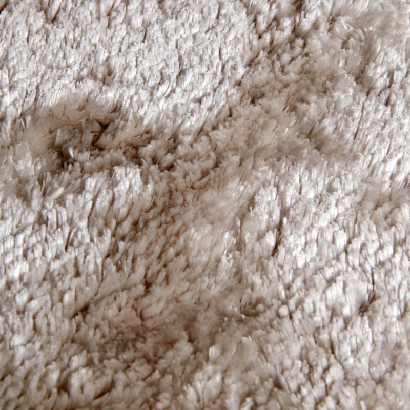 Close-up of beige textured fabric