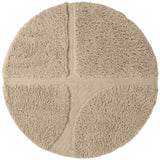 Round beige rug with a textured surface on a white background