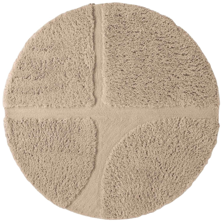 Round beige rug with a textured surface on a white background