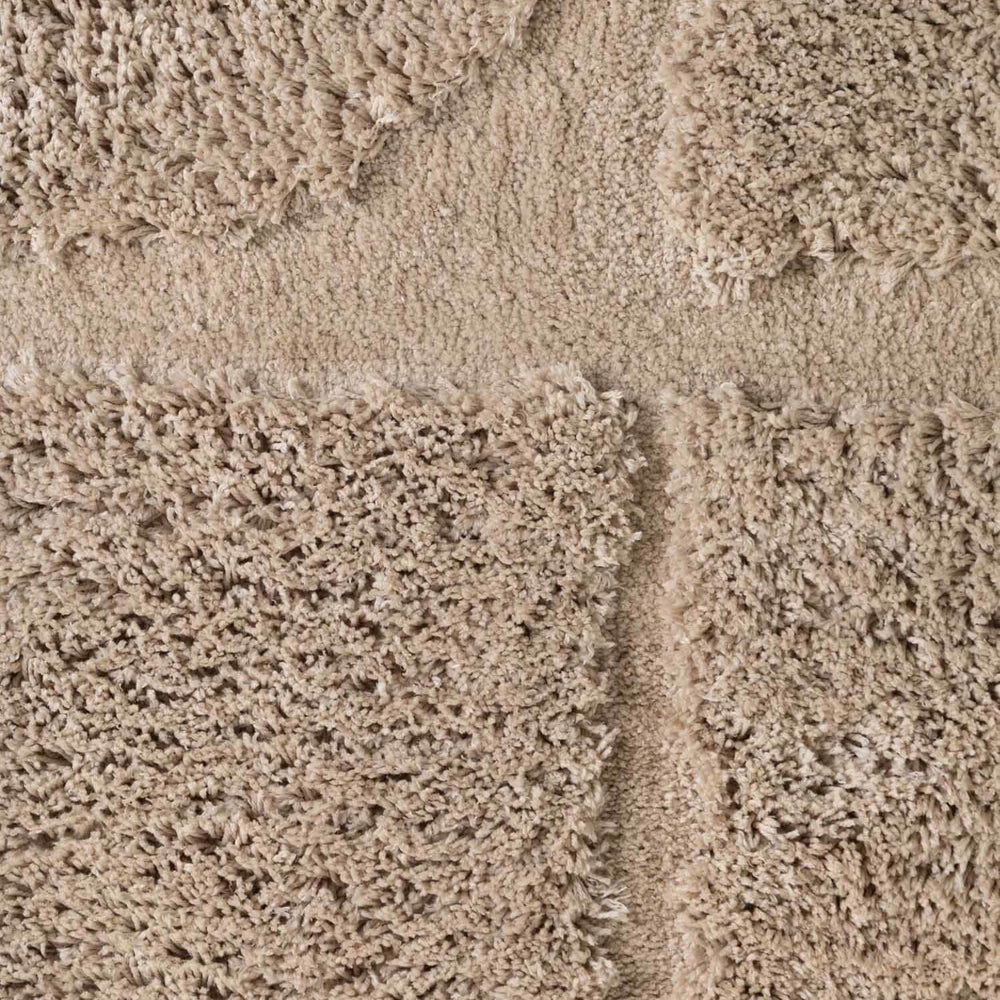 Close-up of beige carpet texture