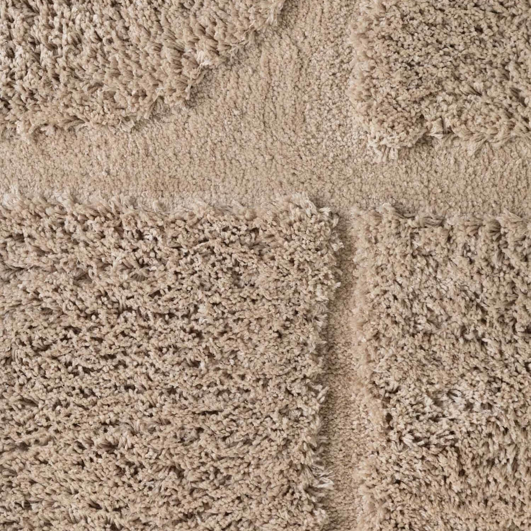 Close-up of beige carpet texture