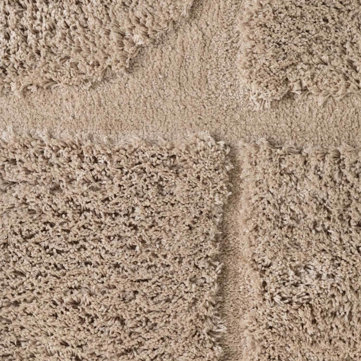 Close-up of beige carpet texture