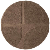 Round brown bath mat with textured surface on a white background