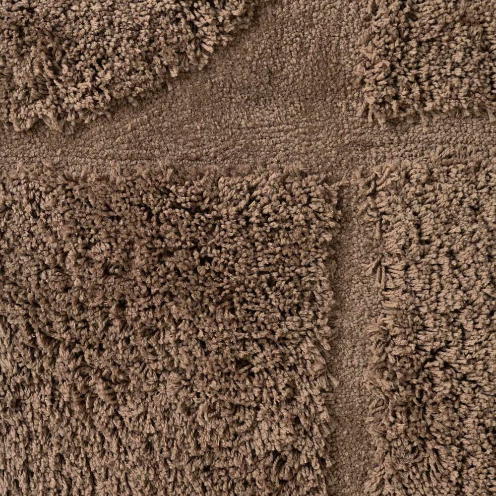Close-up of brown textured carpet