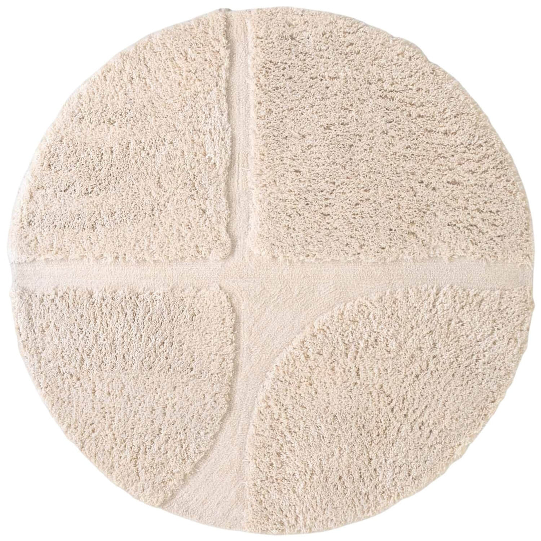 Round beige rug with a textured surface on a white background