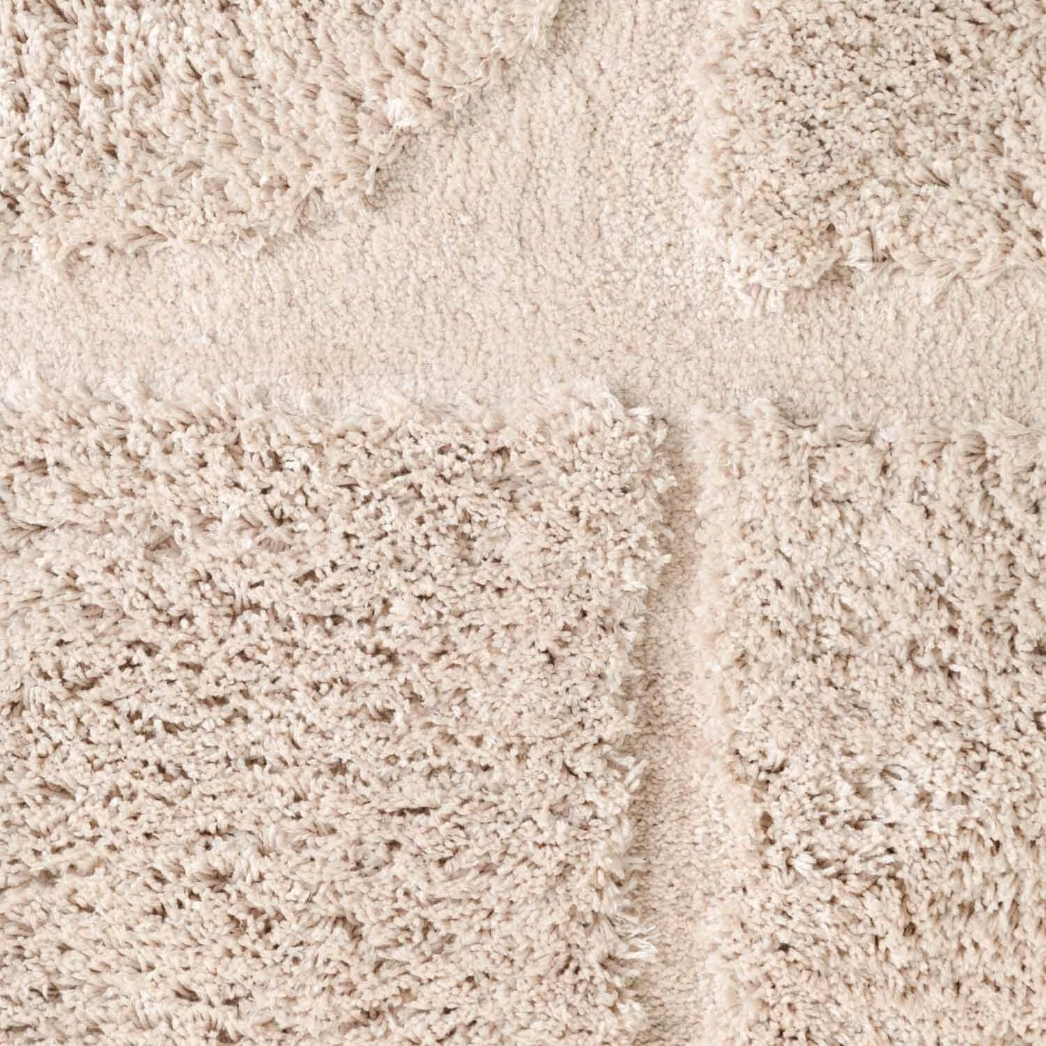 Close-up of beige carpet texture