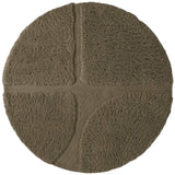 Round brown bath mat with textured surface on a white background
