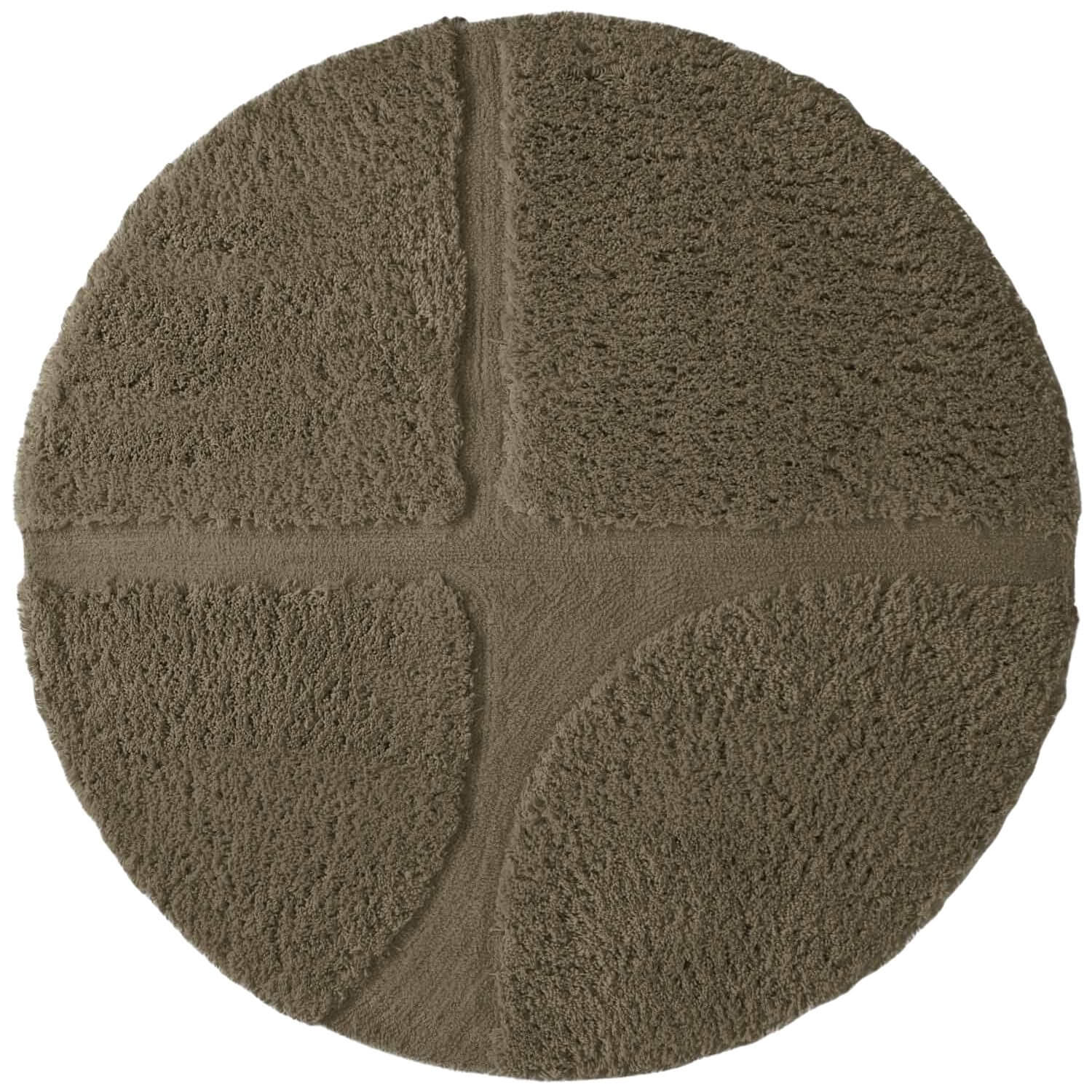 Round brown bath mat with textured surface on a white background