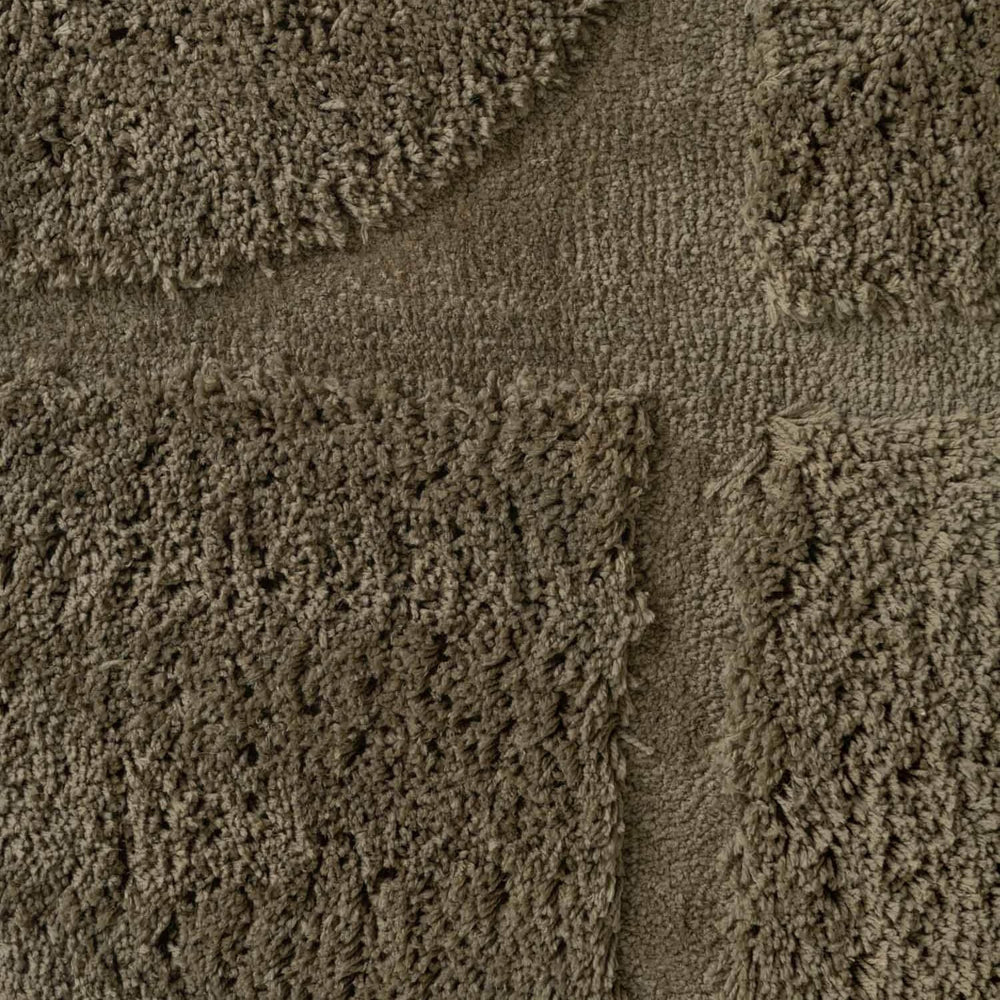 Close-up of textured brown carpet