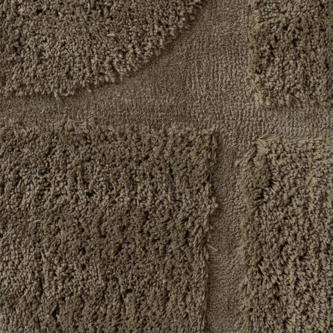 Close-up of textured brown carpet