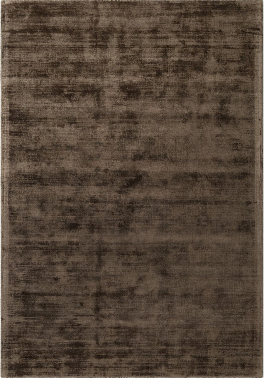 Textured brown rug with a subtle pattern