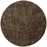 Round brown rug on a white background