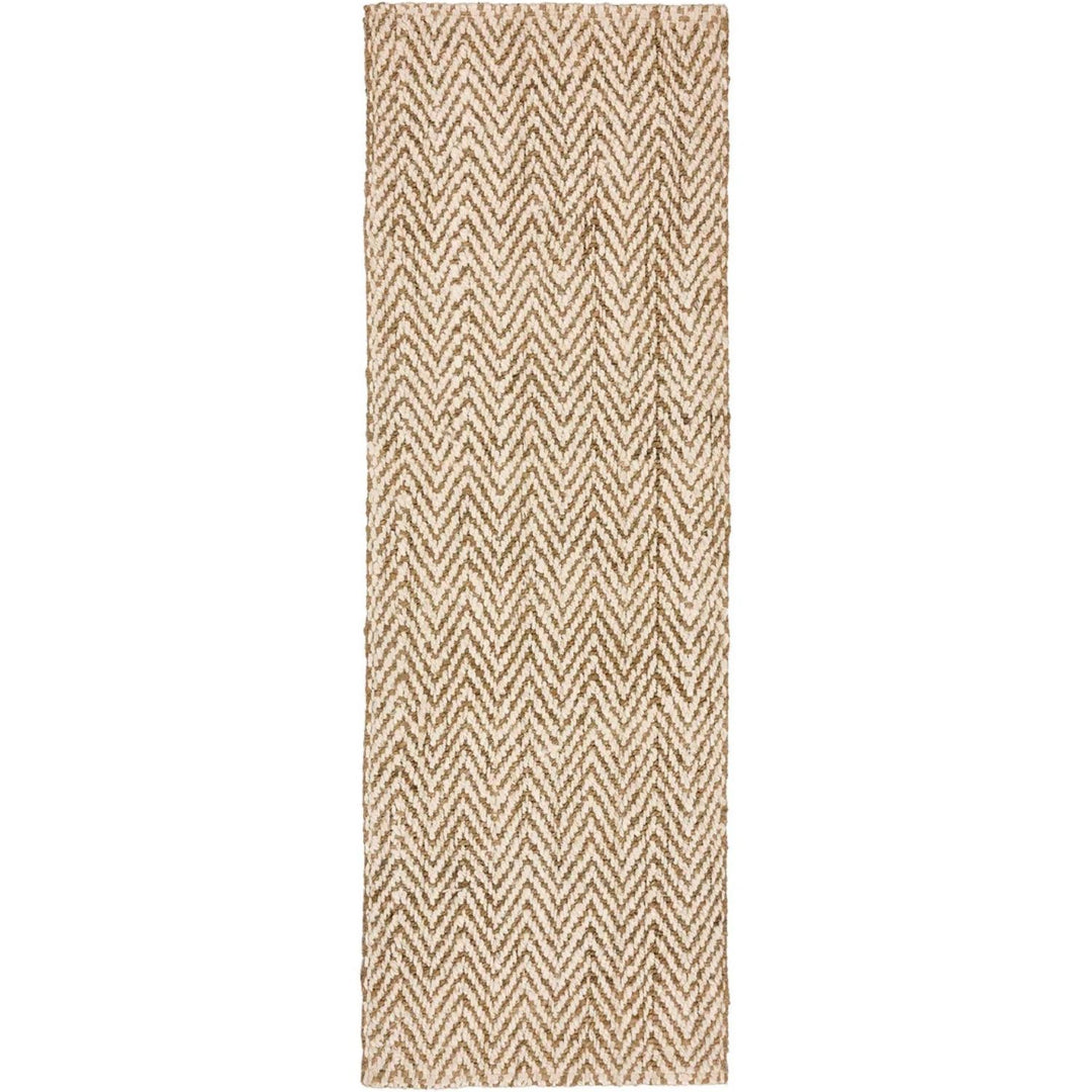 Beige and brown chevron patterned rug on a white background