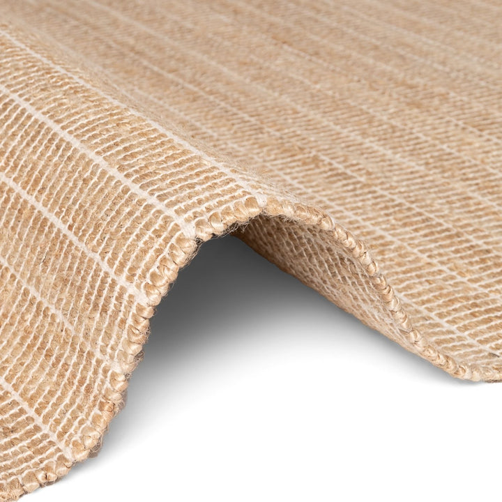Close-up of a roll of brown paper with textured surface