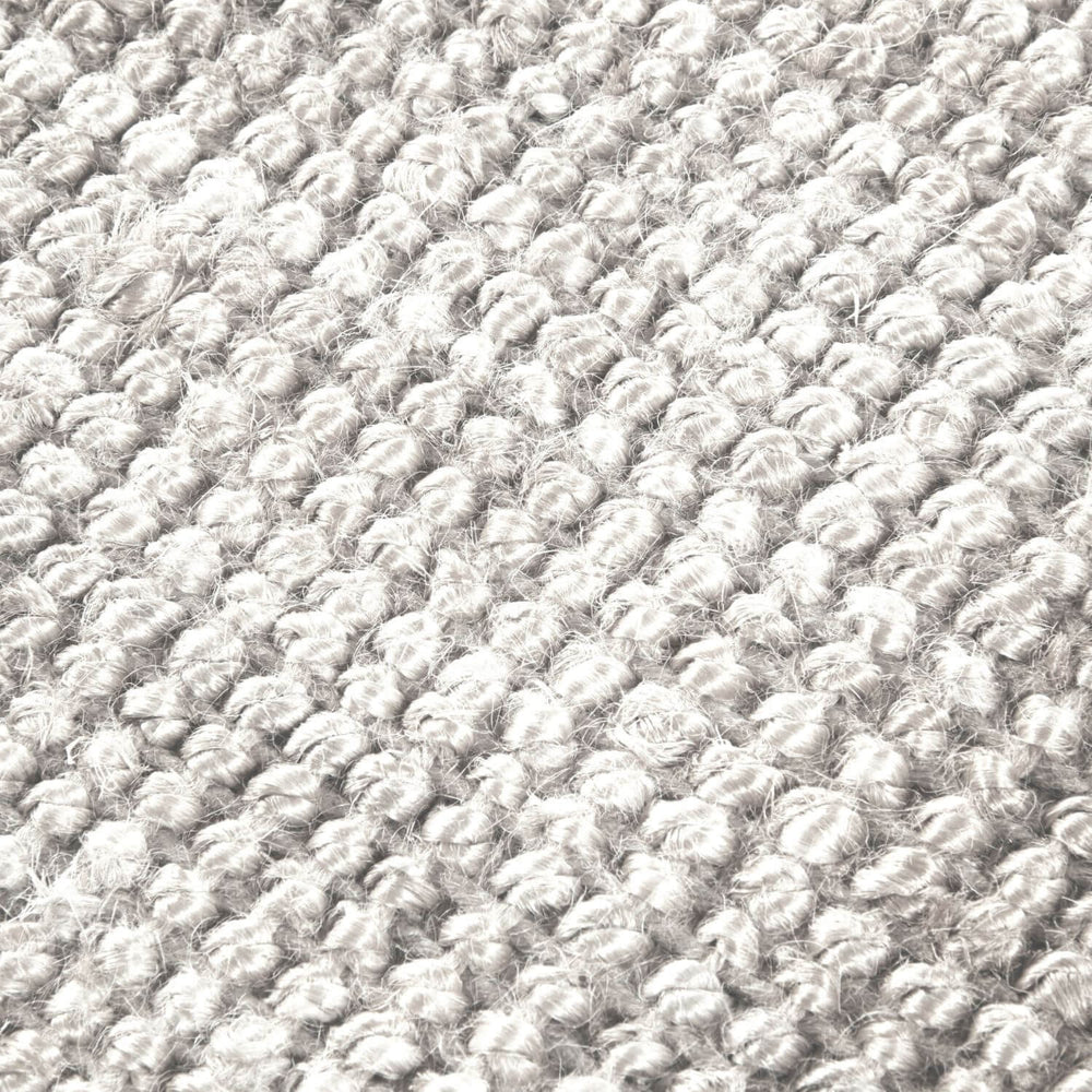 Close-up of textured gray carpet