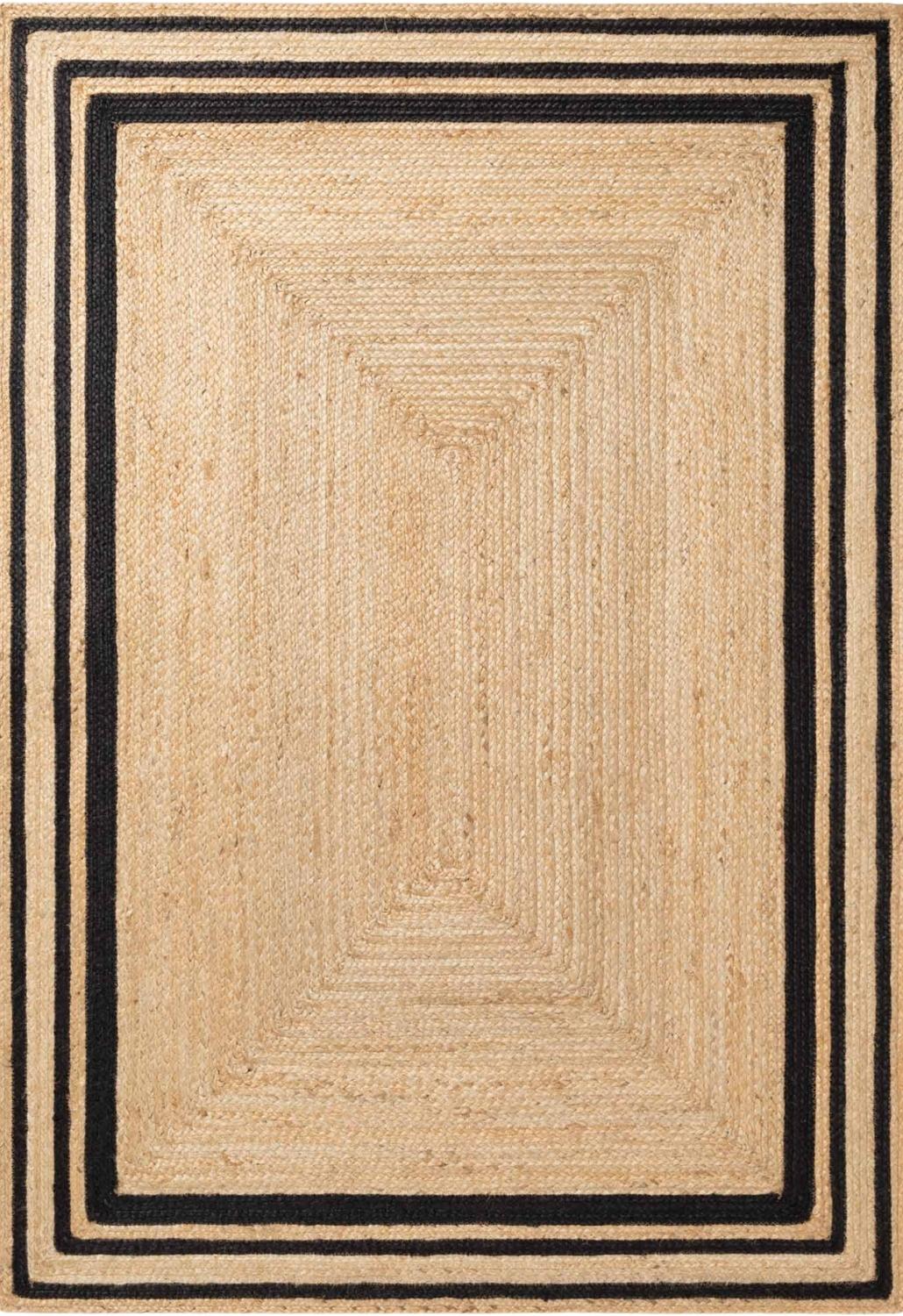 Beige area rug with black border