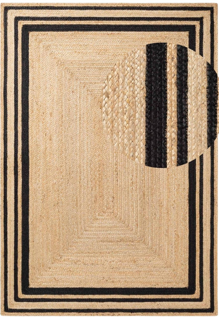 Beige and black braided rug with geometric pattern