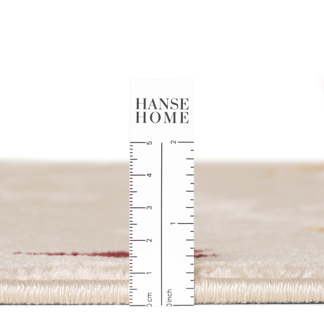 Textured fabric swatch with a ruler and 'HANSE HOME' branding on a white background